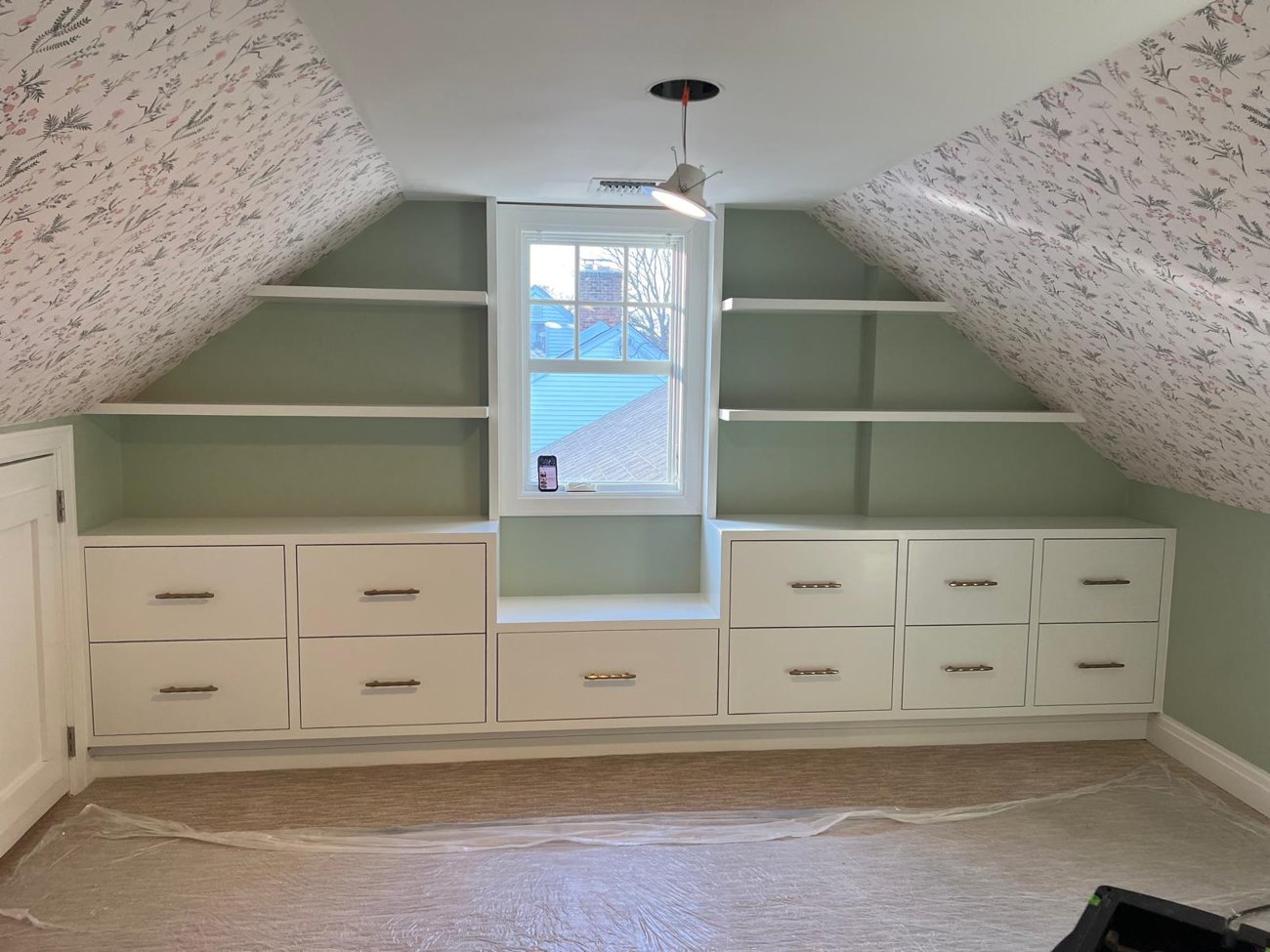 Custom attic built-ins by Familia Juarez Construction