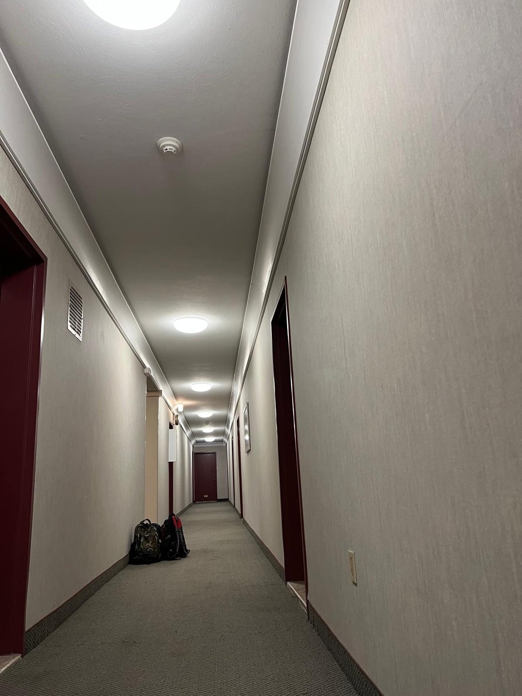 Hallway after: finished crown molding and paint
