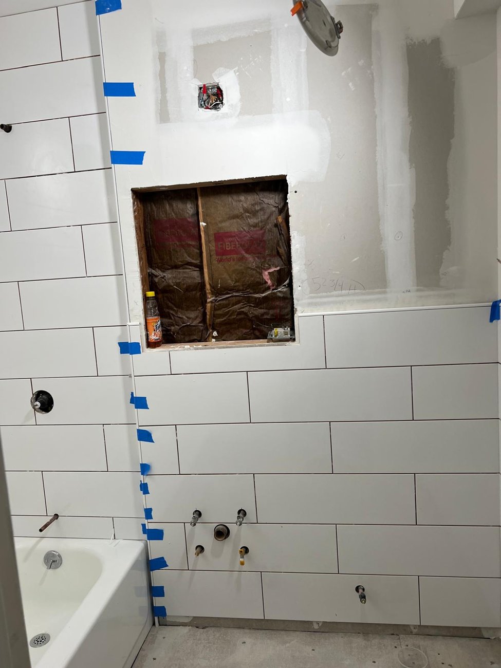Walls tiled, niche framed and ready