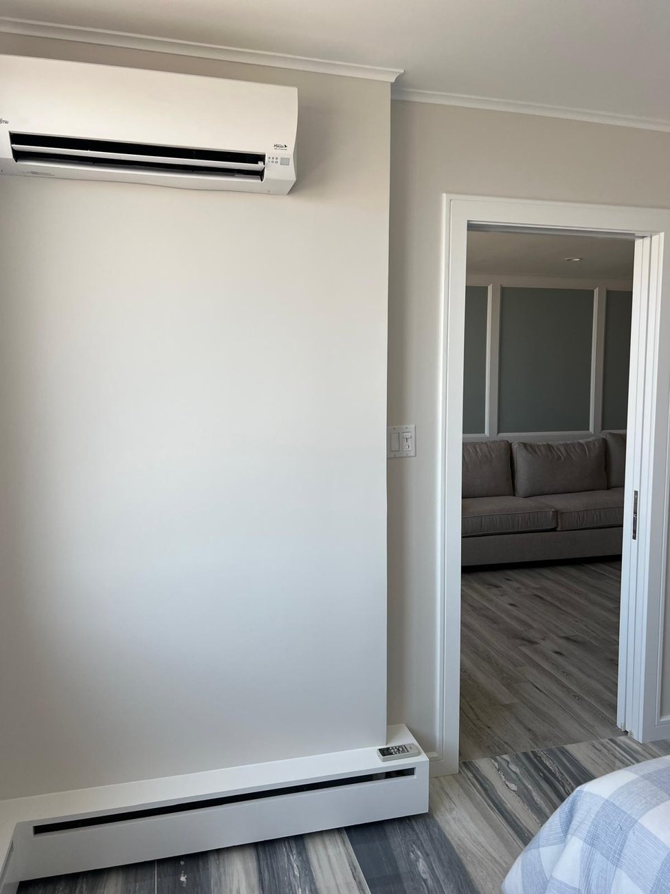 Mini-split AC installed with clean trim work around it